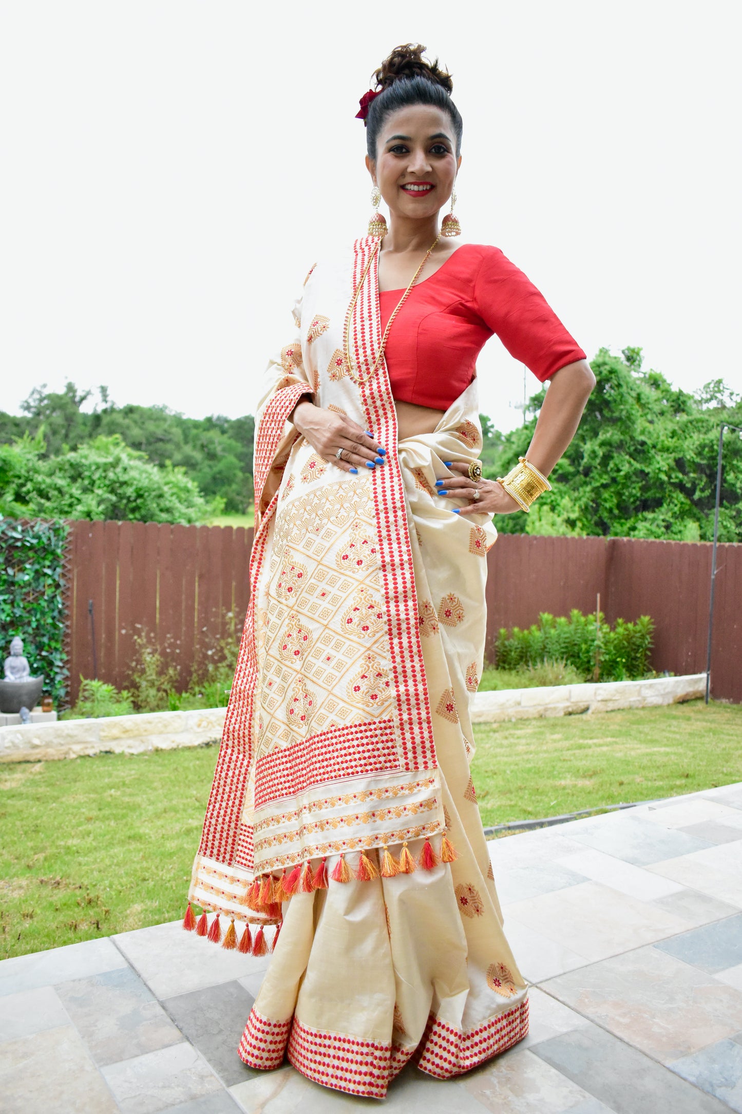 Handmade Combination of Assam Tussar (weft )& Assam Silk (warp) Saree with Red and Gold Motif